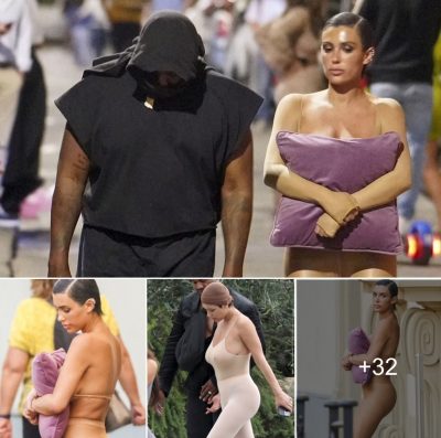 Kanye West’s wife was almost topless, hugging a pillow to cover her chest on the street