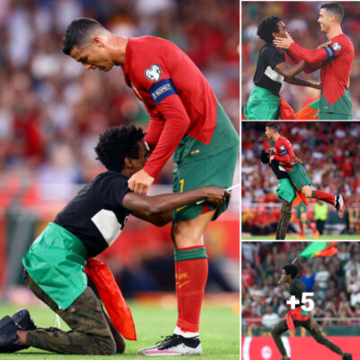 “Unforgettable Moment: Ronaldo Hoisted by Pitch Invader During Portugal’s Euro Qualifier Against Bosnia”
